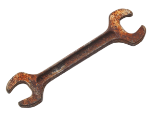 a rusty wrench on a white background