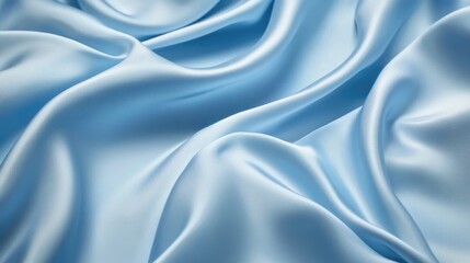 Soft pastel blue fabric texture showcasing elegant draping and a smooth sheen, perfect for spring-themed designs and fashion applications.