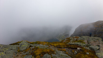 Foggy Mountain Landscape with Lone Hiker