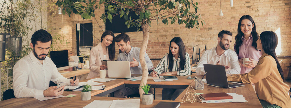 Nice attractive cheerful confident skilled people meeting analyzing economy finance growth plan result at modern industrial loft brick open space style interior workplace workstation