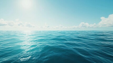 Obraz premium Peaceful turquoise sea under a clear blue sky, perfect for a tropical ocean backdrop