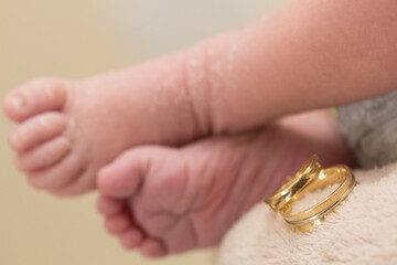 Wedding Ring and Newborn: Celebrating Love and New Life in One Beautiful Moment