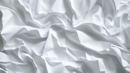 Wrinkled white silk or satin fabric texture creates flowing abstract waves perfect for elegant bedding advertisements or clean marketing backgrounds.