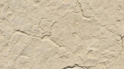Fototapeta premium Textured stone surface with rough and uneven edges, perfect for background, hard