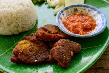 Nasi Empal Penyet Indonesian Deep Fried Beef Slices Served with Steamed Rice and Sambal Chili Sauce