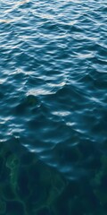 Fototapeta premium Rippling water surface with smooth, flowing texture, nature