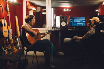 Acoustic session with a guitarist and producer