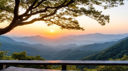 Majestic Sunrise Over Mountain Range: Clear Skies and Serene Landscape