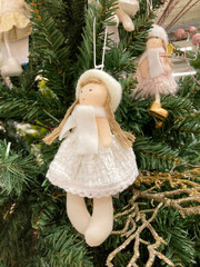 Christmas decoration Little doll hanging in the tree