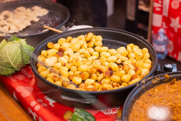 delicious national home-cooked grilled food at the festive Christmas market in Gdansk Poland
