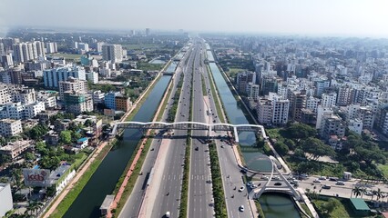 Dhaka 300 feet Kuril skyline aerial drone view from above, lake Michigan and city of Bangladesh Capital downtown skyscrapers cityscape bird's view from the city, Beautiful aerial drone city photograph