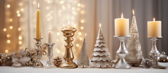 Elegant Christmas decor featuring golden candlesticks and shimmering silver ornaments creating a festive ambiance for winter celebrations.