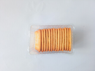 Sugar coated biscuits, also known as malkist, sweet and crispy. Served in plastic mica box