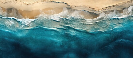 Fototapeta premium Aerial view of pristine beach and turquoise sea within a national park showcasing natural beauty and coastal tranquility.