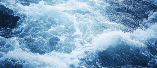 Rippling waves on a river's surface showcasing dynamic water movement and vibrant blue tones under natural lighting.