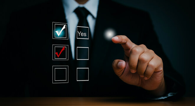 Using a Yes No Choice Checkbox to Make Selection s In a survey or professional setting, a hand choosing  Yes  from a computerized checkbox interface represents agreement, approval, or decision-making