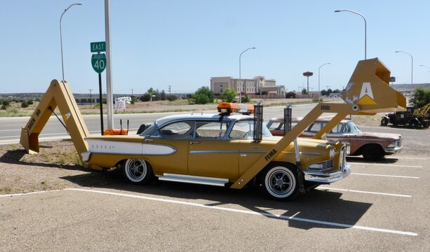 Yellow Edsel Digger outside The Route 66 Auto Museum. Santa Rosa NM, USA. June 10, 2014. 