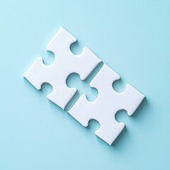 Obraz premium Two white puzzle pieces connected on a light blue background.