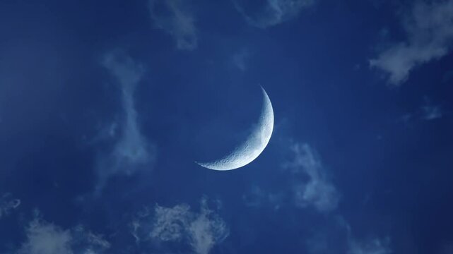 Dreamy Crescent Moon with Soft Clouds