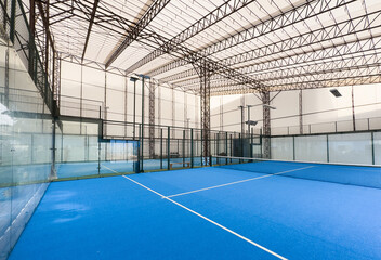  Paddle tennis blue court without people 