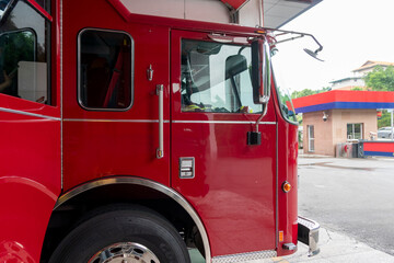 The fire truck parked in the garage