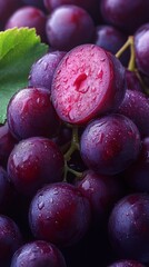 Fototapeta premium Close-up of Fresh Purple Grapes with Water Droplets - A Healthy and Delicious Treat