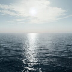 Obraz premium Serene Ocean View: A Vast Expanse of Calm Water Under a Cloudless Sky