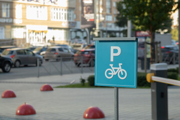 Bike parking sign with a blurred bicycle background, Novosibirsk