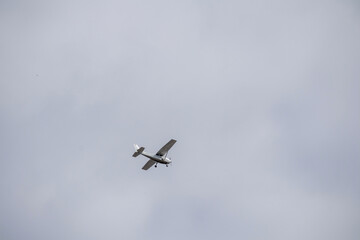 
a small passenger plane in flight in the sky