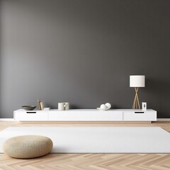 Minimalist living room with white rug, ottoman, and grey wall.