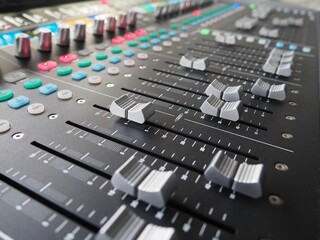 Professional audio mixing console close-up.