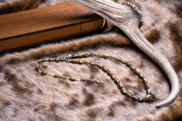 Ottoman Amber Rosary Collection products are natural and concept shot on leather fur (focusing on...