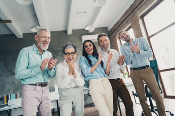 Photo of teamwork startup partners clapping hands applause congratulation comfortable nice creative startup office loft room interior