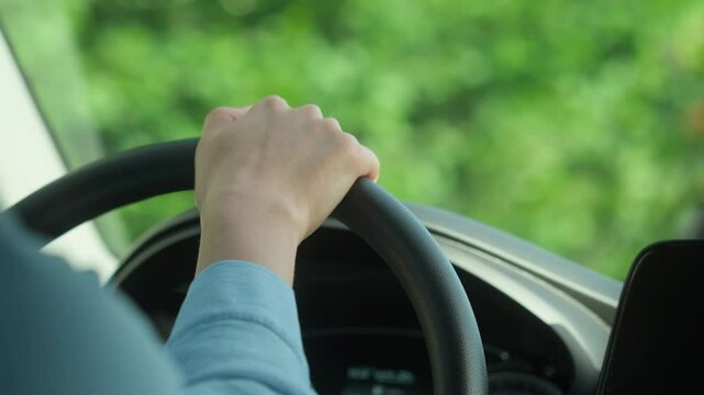 Unrecognizable woman girl lady hands holding steering wheel car girl businesswoman female driver driving automobile travel in city vehicle rent trip test drive transportation buying new electric auto