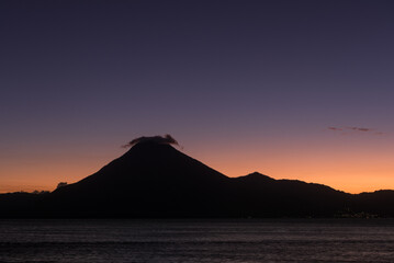 Atitlan Lake in Guatemala. Long Exposure Night Photo Shoot. Volcano in Background. Lake Atitlan is the deepest lake in all of Central America with a maximum depth of about 340 meters or 1120 feet.