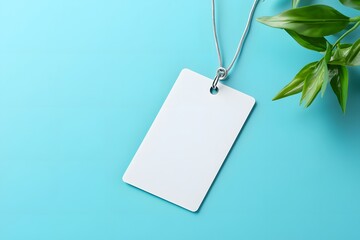 Blank ID Badge with Lanyard on Light Blue Background Representing Identity, Security