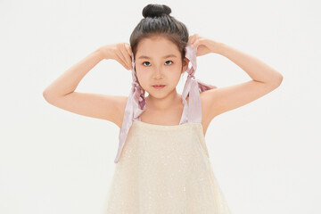 Lively and cute little Chinese girl on white background  child 