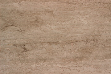 Obraz premium Background of light beige natural stone with fine stripes and natural patterns. Perfect for use as a texture in design, architecture, or backgrounds