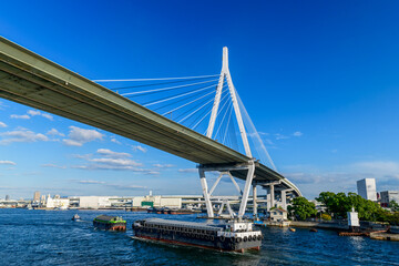  landscape of Tempozan Bridge. It is a cable-stayed bridge with harp design in Osaka, Japan.