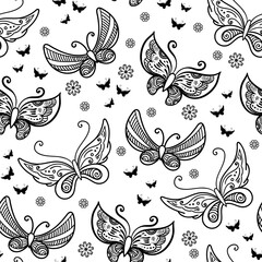 Hand drawn flowers and butterfly seamless pattern. Black and white vector illustration in doodles style. Isolated on white background. Coloring book page.