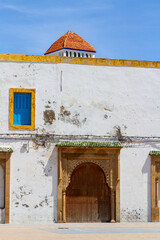 Urban architecture. Background. Part of the facade of a white historic building with a beautiful...
