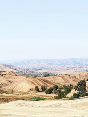 Stunning Scenery of Rolling Hills and Mountains: A Breathtaking Rural Landscape