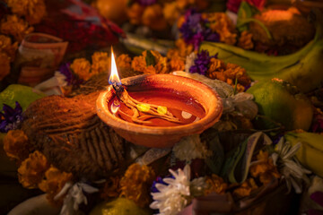 Chhath Puja Parwa Sun God Celebration with Fruits, Lights and Lamps in riverside in Nepal and India with lights, lamps diya after diwali