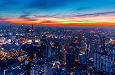 Obraz premium Aerial view panorama view of skyscrapers night sunset lighting Bangkok city Thailand