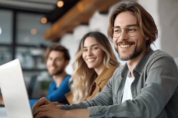 Smiling male and female project managers collaborating on laptop in office medium shot professional photography bokeh background