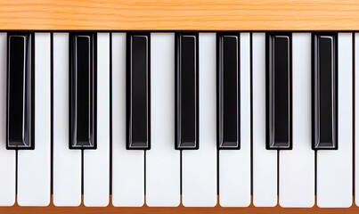 Close-up overhead shot of a section of piano keys, showcasing the black and white keys and wooden frame. Ideal for musical backgrounds or concepts.