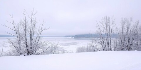 Snowy landscape with bare trees and frozen lake in the background, calm, snowy scenery, cold weather