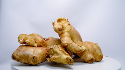 Fresh Ginger Root on White Background  
