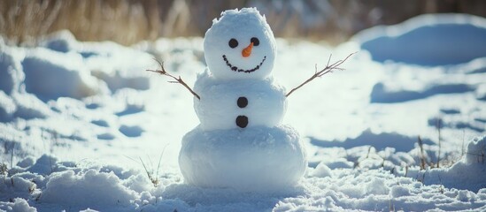 Obraz premium Cheerful snowman stands in a snowy landscape embodying winter spirit and festive joy with bright sunlit background