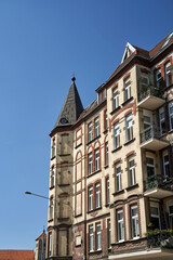 facades of historic tenement houses with balconies in the city of Poznan